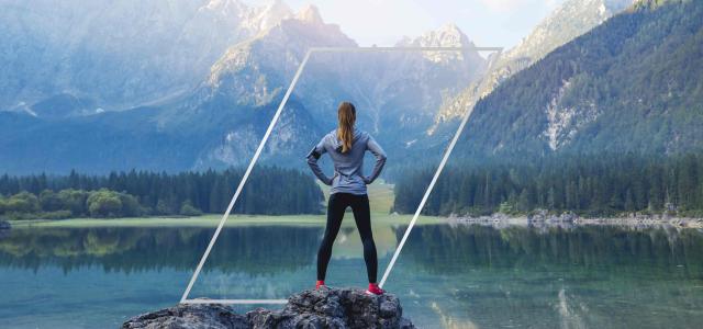 woman at edge of lake